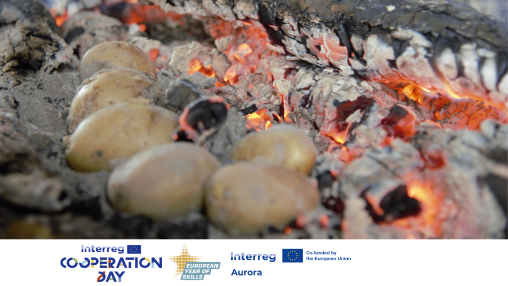 Photo of potatoes in a firebed, from the Interreg Aurora project Máhtut. Logos from Interreg Aurora, Interreg Cooperation Day and European Year of Skills.