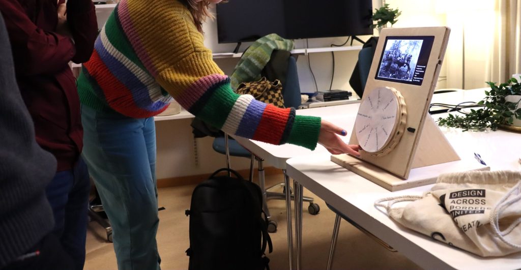 User interaction with the Storywheel prototype during the Umeå University workshop, 2026. Photo credits: Emma Kirjavainen / Indigenous Digital Storytelling with New Media (Interreg Aurora).